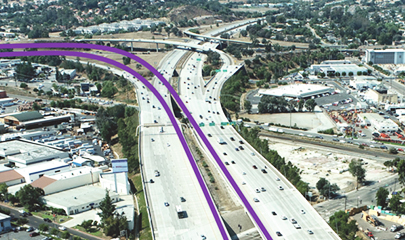 I-15 and SR 78 managed lanes direct connectors project showing aerial view of Escondido I-15 northbound with SR 78 connected on the west side. Coming from the south, there are two purple lines drawn over the photo on the left shoulders of the I-15 freeway north and southbound, following westbound into the SR 78.